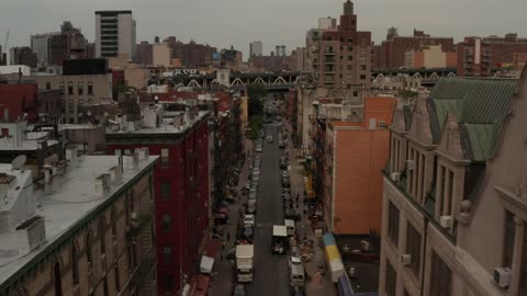 Flying over a street in a New York neighborhood