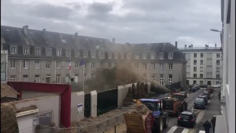 FRANCE - Farmers are spraying shit all over council buildings today!