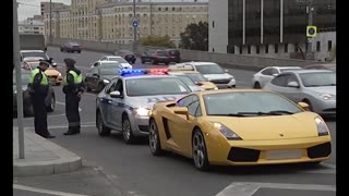 Rude Lambo Driver Holds Up Ambulance With Sirens On