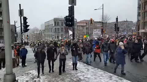 Montreal peaceful protest of thousands, police show up in riot gear.