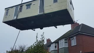 Static caravan being craned into position #5