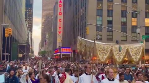 5,000+ Catholics walked down the streets of New York City praying and singing for peace.