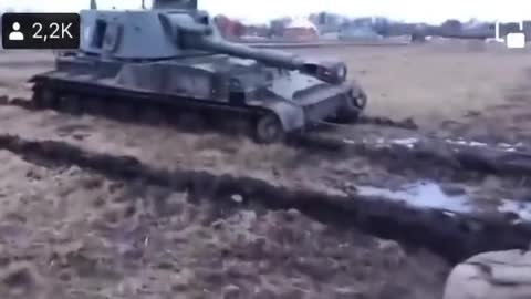 Russian tank stuck in mud.