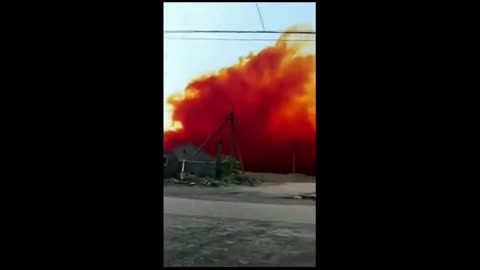 Chemical plant explodes with reddish-orange color smoke