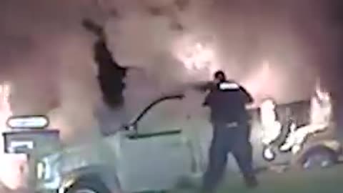 DASHCAM VIDEOS CAPTURES A HEROIC OFFICER SAVING A WOMEN FROM A FIERY CRASH
