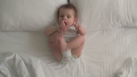 Baby Boy Sucking her Toes