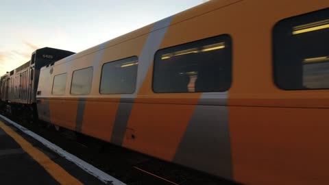 Via Rail passenger train and Sunset....