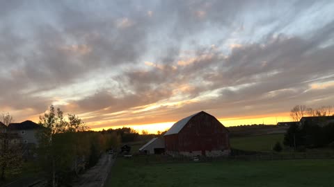 Breathtaking Time Lapse Video of a House and Farm During the Golden Hour