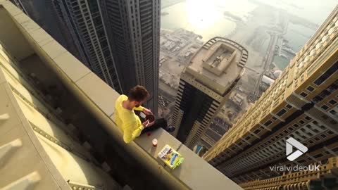 Having breakfast on the edge of Dubai tower