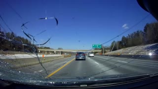 Flying Sheet of Ice Shatters Windshield on Interstate