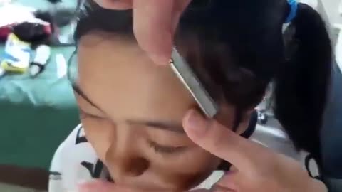 Woman shave her head at private hotel room