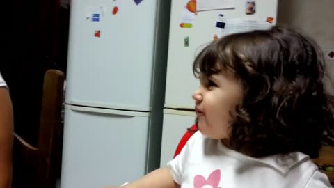 Little Girl's Priceless Reaction After Tasting An Onion For The Very First Time