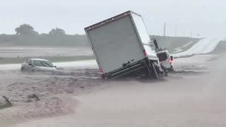 Flash floods inundate Texas highway
