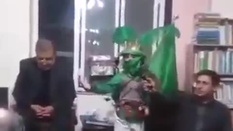Kid hitting man's head with his toy sword while playing