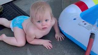 Toddler Slips and Falls onto Inflatable Pool