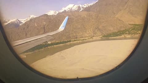Flight Landing Approach at Skardu International Airport Pakistan. Cold Dessert Landing Btw Mountains