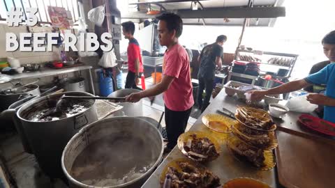 Tour of hot street food in Jakarta, Indonesia! BEST BBQ Ribs, Painful Spice, and Muddy Crabs!