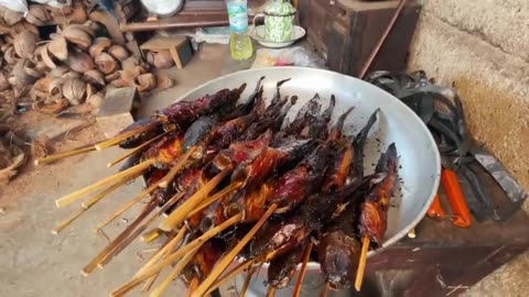 Food tour to Javanese Street Food in Yogyakarta Dinosaur Barbecue and Bone Marrow Juice