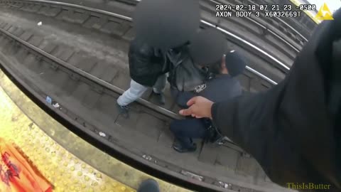 NYPD officers help save man from subway track
