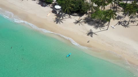 an almost empty beach in waikiki hawaii