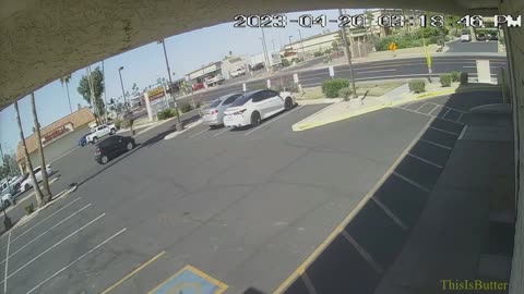 Surveillance video shows bank robbery suspect shooting at Phoenix police helicopter, then shot by PD