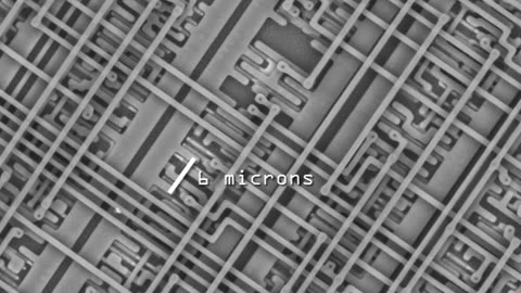 Nano Size Structured Chip Zoomed In On With Digital Phone Camera Until They Use SEM To Zoom Even Further