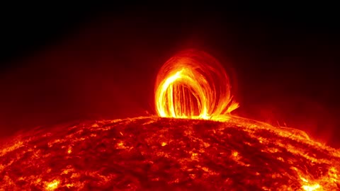 Stunning footage of fiery looping rain on the sun captured by NASA's SDO