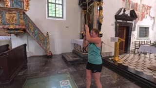 Ringing the Bled Island Church's Bell in Bled Slovenia / Assumption of Maria Church