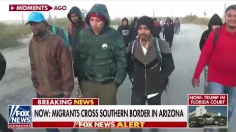 Migrants cross southern border in Arizona