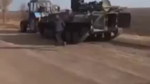 Ukrainian Farmer Steals Russian AA Vehicle With Tractor | #Shorts