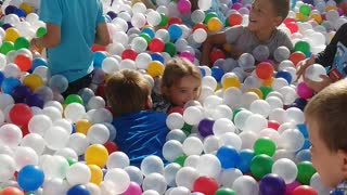 Children drown in colored balls