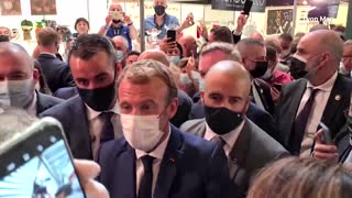 Protester throws egg at Macron, shouts 'Vive la revolution'