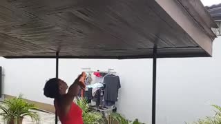 Lady yells greetings to her neighbors during quarantine