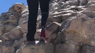 cojo climbing a mountain in arizona