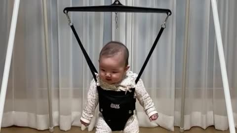 Baby practicing walking.