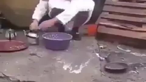 Washing the dishes in a funny way