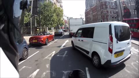 Van Nearly Sideswipes Motorcyclist