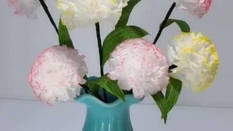 Make six carnations with tissue and give them to mom