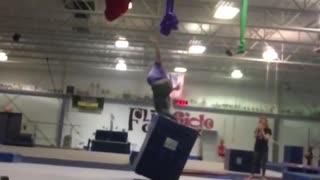 Acrobat backflip loses balance