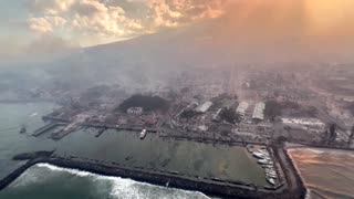Aerial video over Maui shows smoke rising from fire