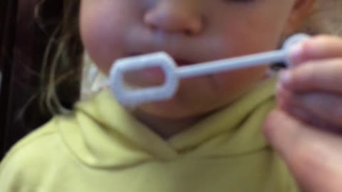 Hilarious, Cute toddler learning to blow Bubbles, But watch how! : - DD