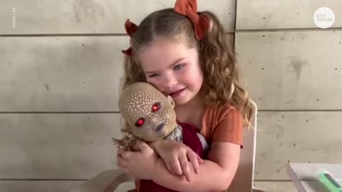 Little girl celebrates 'spooky season' all year with her favorite doll