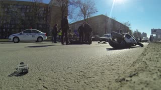 Motorcycle Rides Between Lanes and Crashes