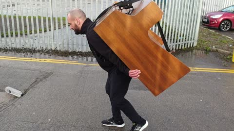 Guy carries 400lb Piano to band practice