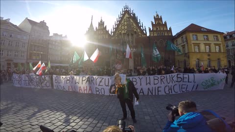 Polish anti-immigrant protesters burn photo of Angela Merkel