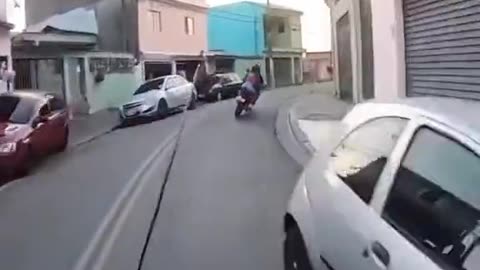 Guy Attempts Crazy Escape on Motorbike