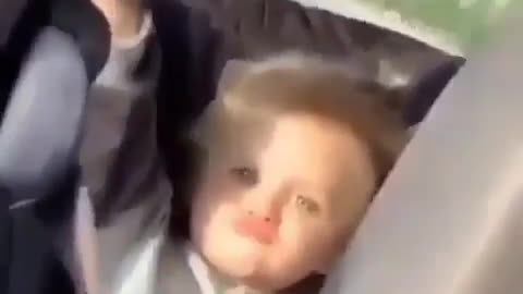 Cute funny kid attempting a selfie