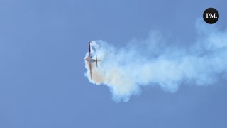 Pilot Gord Price performs daredevil acrobatics at the Canadian International Air Show