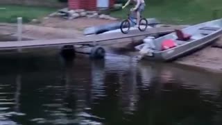 Slippery Dock Leads to Lake Jump Slide