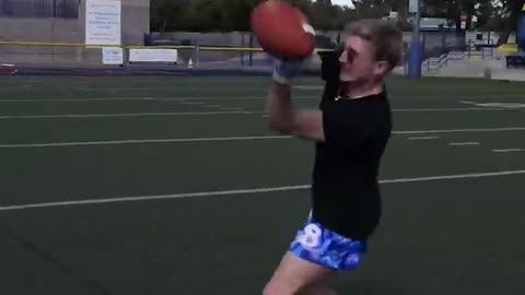 Trying to catch the fastest football ever thrown